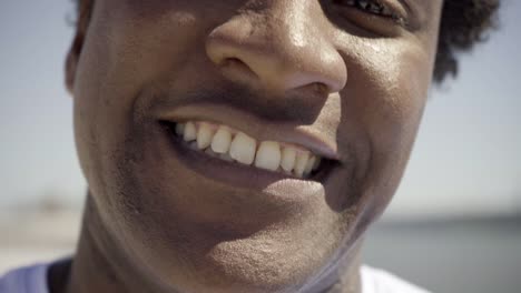 Closeup-shot-of-African-American-man-with-toothy-smile
